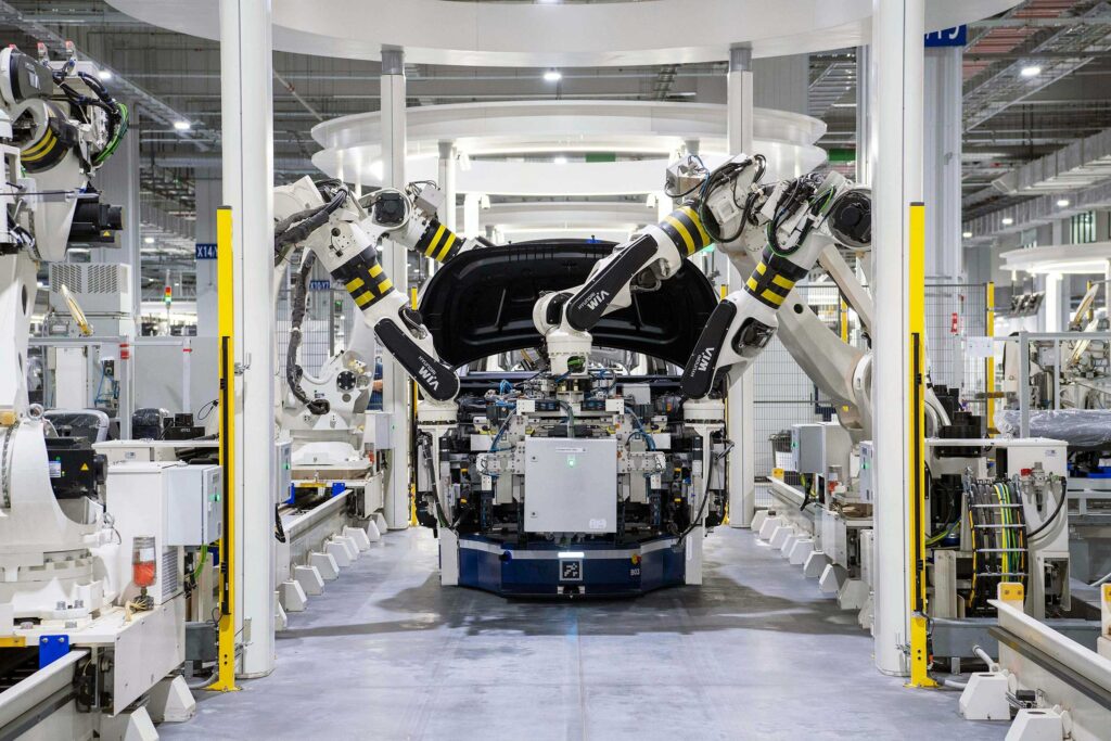 Ligne de production automobile pour illustrer le transfert industriel