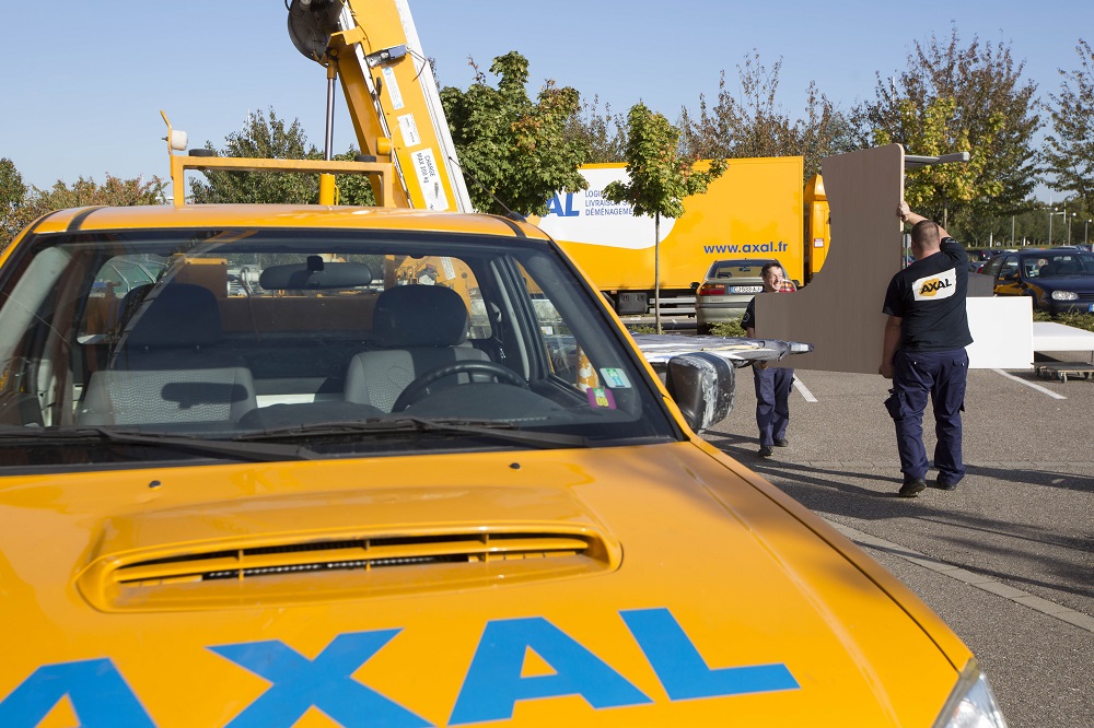 Véhicules de transport Axal utilisés pour le vidage de locaux professionnels